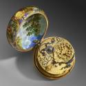 Image of the opened watch taken from above revealing the signed movement in gilt bronze and ste…