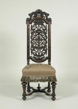 Alternate view of walnut chair with openwork back and embroidered seat showing flowers, fruit, …