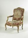 Side view of Armchair: Part of a Set of Two Canapés, Eight Armchairs and a Fire Screen Showing …