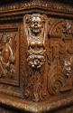 Wood carving on corner of dressoir