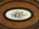 Close up of Sevres porcelain plaque depicting a bouquet of flowers and fruits