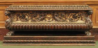 Front view of Chest with emblem, large acanthus rinceaux and parcel Gilding