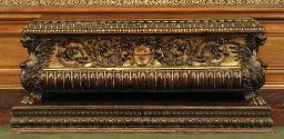 Oblong walnut chest with harpies, winged lions, and vegetal decoration, gilded