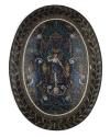 Reverse side of dish depicting fame flanked by two mythical creatures