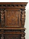Detail of carved figural decoration from cabinet