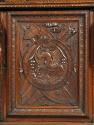 Detail of carved decoration from cabinet, showing winged horse
