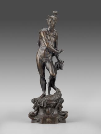 A bronze sculpture of Mars.  His head is turned to his right, his right hand reaches to his lef…