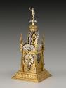 Three-quarter frontal view of Table Clock with Astronomical and Calendrical Dials, lavishly dec…