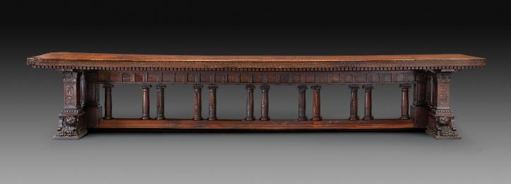 Long Center Table with Columnar Supports and Animal Masks