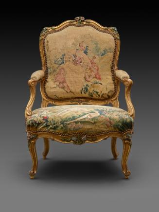 Front view of Armchair with Gilt and Polychrome Frame and Beauvais Tapestry Cover Showing Pasto…