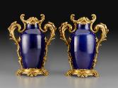 Pair of blue hard-paste porcelain and gilt bronze mounted vases