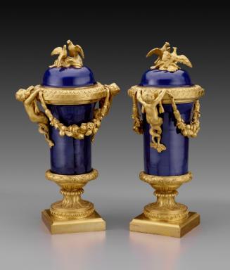 Pair of blue porcelain covered vases mounted with gilt bronze