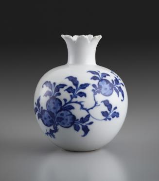White porcelain small vase with underglaze blue floral decoration