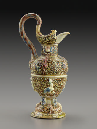 Glazed earthenware ewer with grotesque designs and patterns