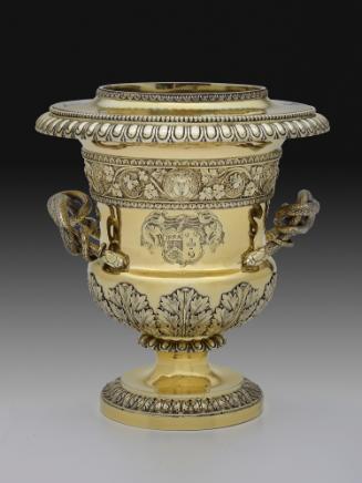 Gilt silver wine cooler with branch handles and family crest