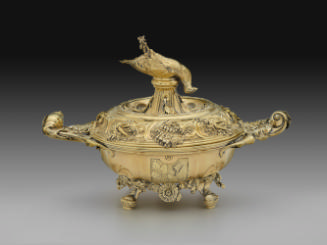 Gilt silver soup tureen with inverted dead pheasant and intricate design