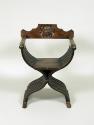 Alternate view of walnut folding armchair with central crest