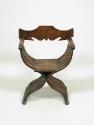 Walnut folding armchair with central shield