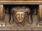Draw-Top Center Table with Columnar Supports and Masks, detail of carved female face