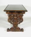 Center Table with Figural and Columnar Supports, view of side of table leg with decoration