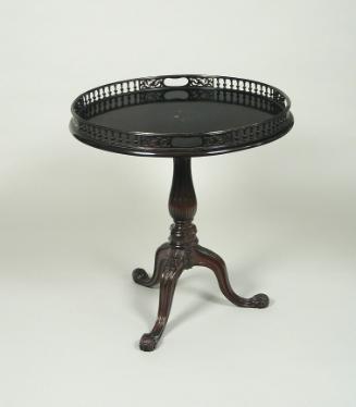 Round mahogany tripod table