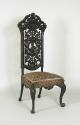 Walnut chair with openwork back and upholstered seat