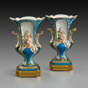 Pair of porcelain vases in blue and white with figures of children