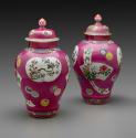 Pair of porcelain covered jars with famille rose decoration