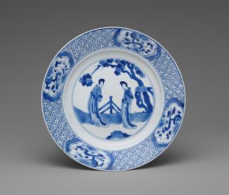 Blue and white porcelain plate with two standing women