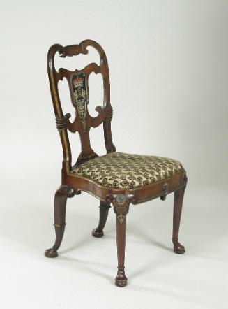 Walnut frame chair with crest and upholstered seat