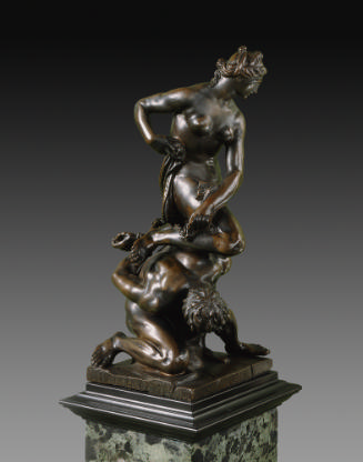 A bronze sculpture of Virtue triumphant over Vice.  Virtue is standing upright and Vice is doub…