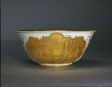 Side view of waste bowl with a large, richly gilded cartouche showing a chinoiserie scene