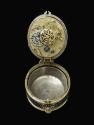 Image of opened pendant clock showing the hinged movement swung above the empty case below it