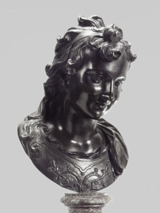 Bronze sculpture of a bust of a boy