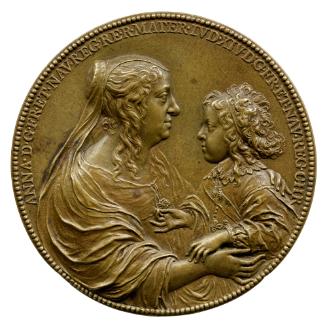 Bronze portrait medal of King Louis XIV of France as a child of six and Queen Anne wearing a wi…