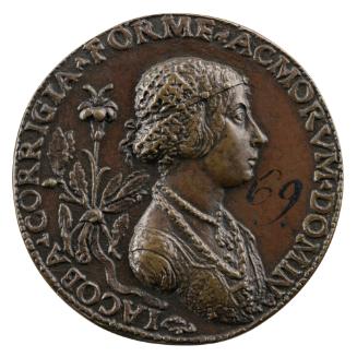 Bronze portrait medal of Jacoba Corregia wearing a brocade dress, two necklaces, a hairnet, and…