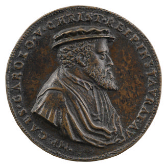 Bronze portrait medal of Emperor Charles V bearded, in a flat cap, in profile to the right; pea…