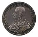 Silver portrait medal of Ferdinando II de' Medici wearing armor, with drapery around his should…